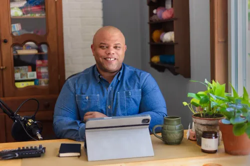 real coach bruce at desk